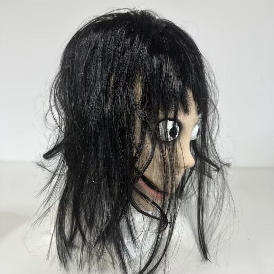 Eng gezichtsmasker meisje (pop) Momo