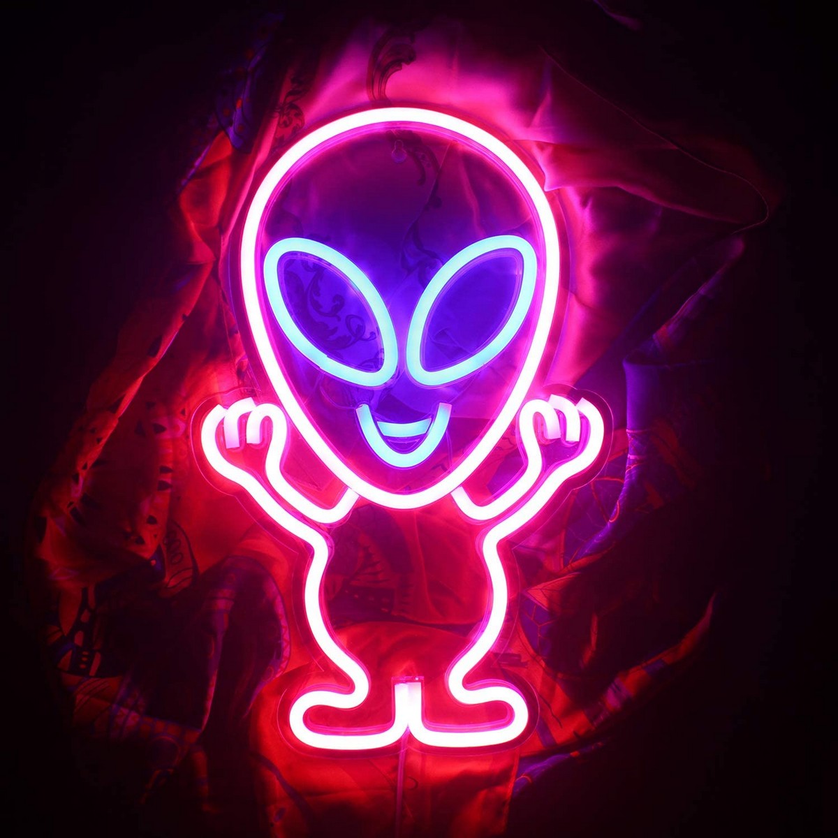 led neon-logo schijnt op de muur - alien